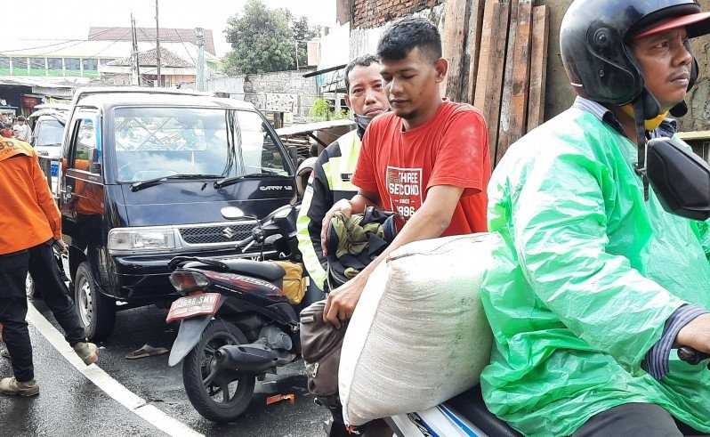 Pedagang Beras Merugi Akibat 300 Kg Beras Rusak Terendam Banjir