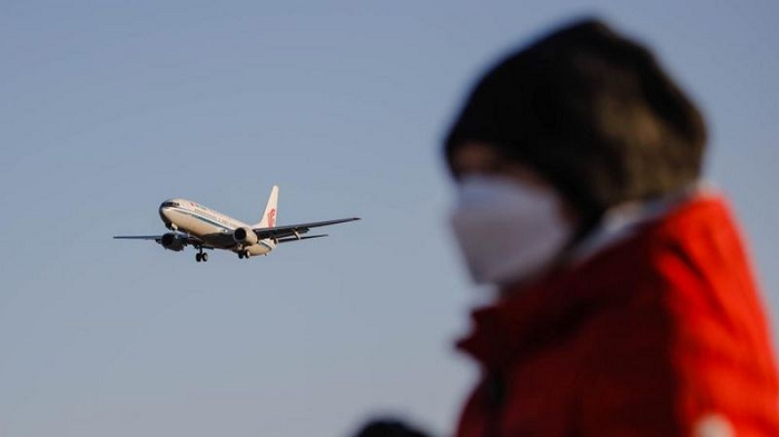 Warga Tiongkok Berbondong-Bondong Beli Tiket Pesawat Setelah Pembatasan Perjalanan Dilonggarkan